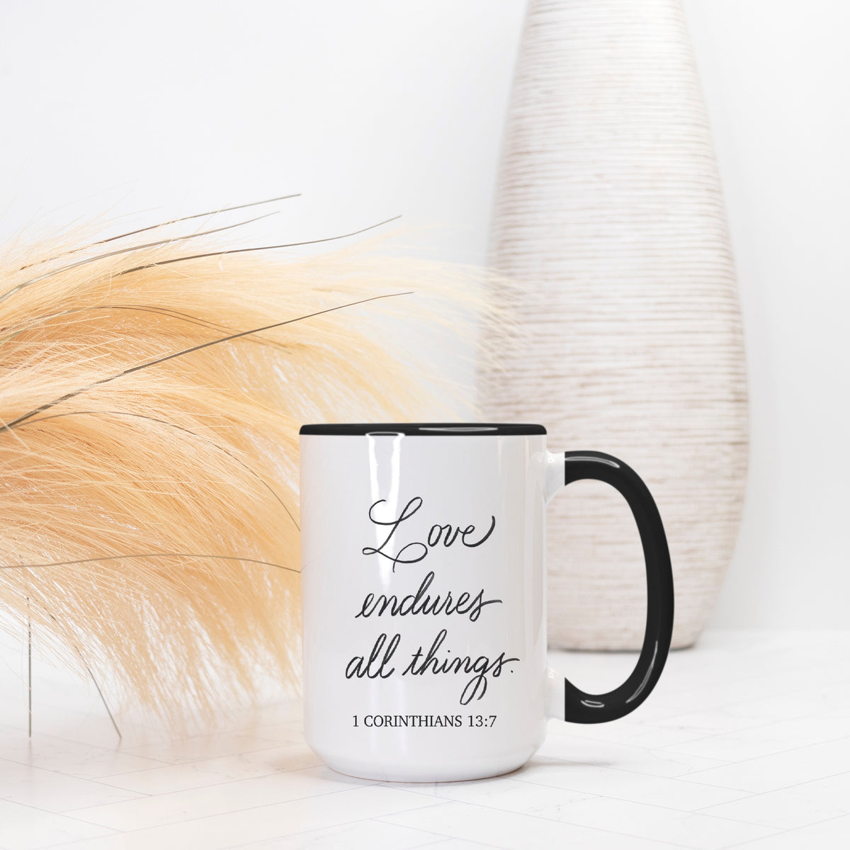 Love Endures All Things – 15 oz. Black & White Mug